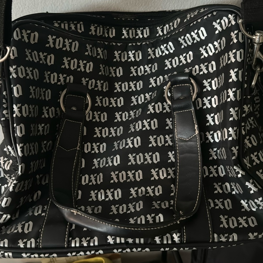 XOXO carry on travel bag, with long strap.2 big pockets, very spacious.